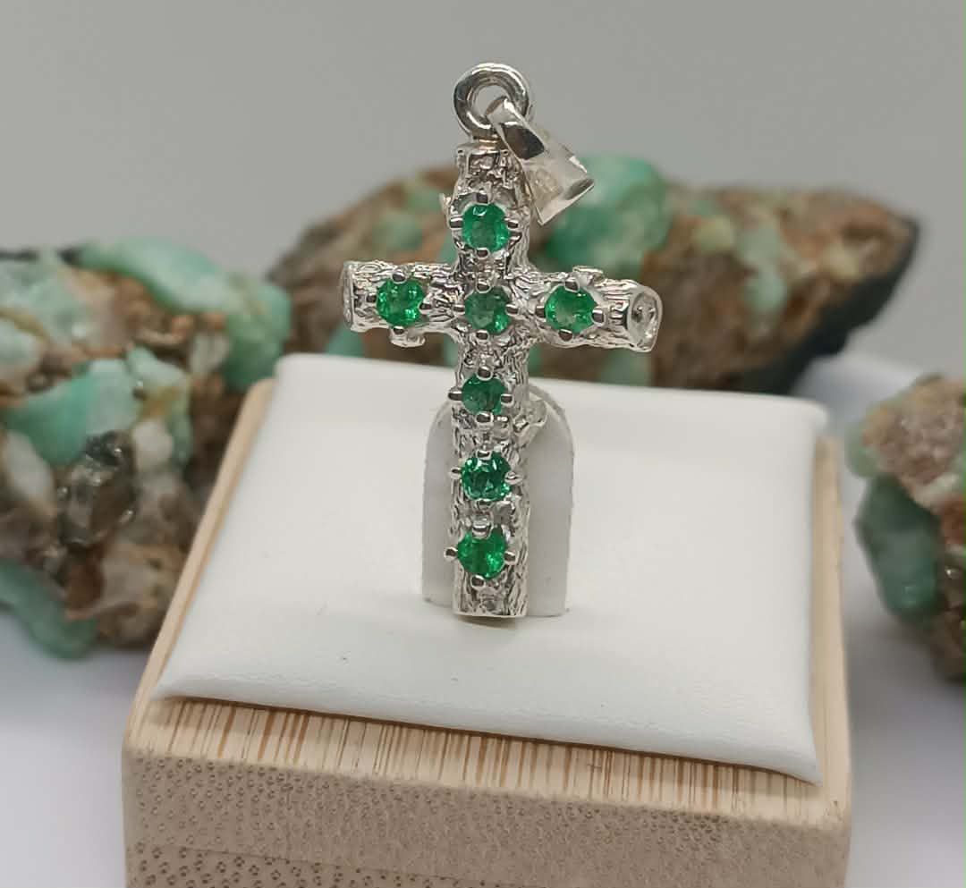 Emerald ring against rainforest backdrop